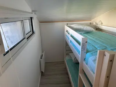 Un ou plusieurs lits dans un hébergement de l'établissement Appartement lumineux et spacieux à deux pas de la plage de Seignosse - FR-1-239-1042
