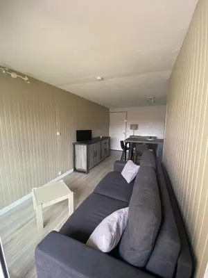 Coin salon dans l'établissement AU BORD DU LAC