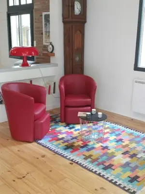 Coin salon dans l'établissement Maison Bel Air