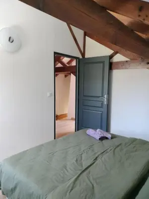 Un ou plusieurs lits dans un hébergement de l'établissement Maison Bel Air