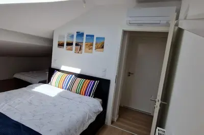 Un ou plusieurs lits dans un hébergement de l'établissement Appartement Villa Trencat