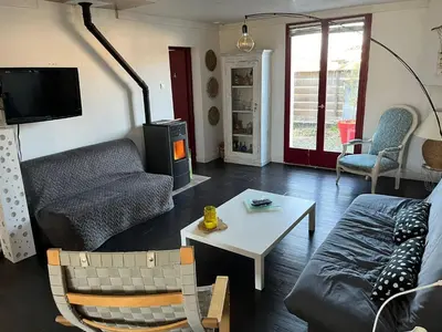 Coin salon dans l'établissement Charmante maison landaise