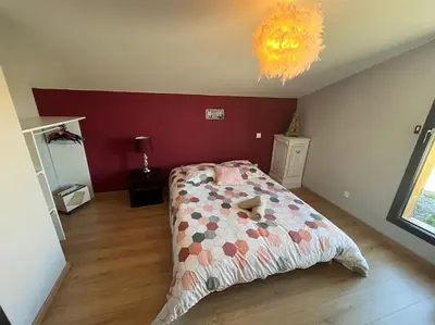Un ou plusieurs lits dans un hébergement de l'établissement Villa calme
