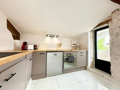 Cuisine ou kitchenette dans l'établissement Les Remparts de Pitrac - Au Cœur de l'Hyper Centre