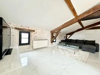 Coin salon dans l'établissement Les Remparts de Pitrac - Au Cœur de l'Hyper Centre
