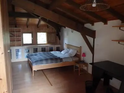 Un ou plusieurs lits dans un hébergement de l'établissement Maison 120 M2, location saisonnière, proche de l'océan.