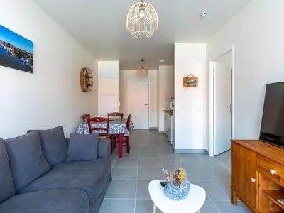 Télévision ou salle de divertissement dans l'établissement Appartement Neuf à Mimizan Plage, à 500m de l'Océan, pour 4 Personnes avec Parking Privé - FR-1-50-133