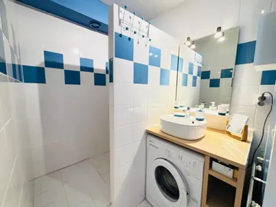 Salle de bains dans l'établissement Les Rives d'Acqs