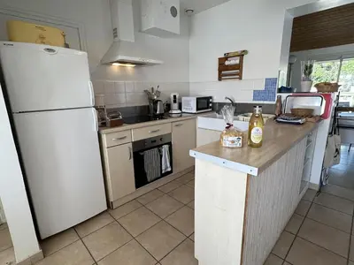 Cuisine ou kitchenette dans l'établissement Dune