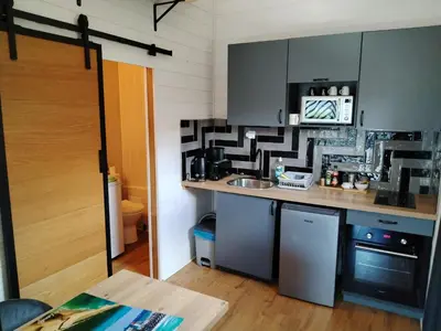 Cuisine ou kitchenette dans l'établissement Chez Cristele et David