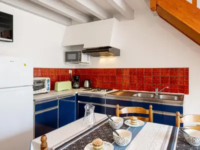 Cuisine ou kitchenette dans l'établissement Holiday Home Sicard-8 by Interhome