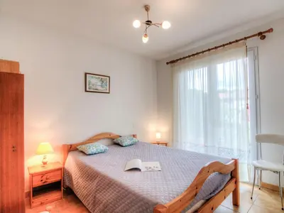 Un ou plusieurs lits dans un hébergement de l'établissement Holiday Home Bosquet aux Ecureuils by Interhome