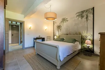 Un ou plusieurs lits dans un hébergement de l'établissement Les Jardins de Lamourelle chambre Prairie