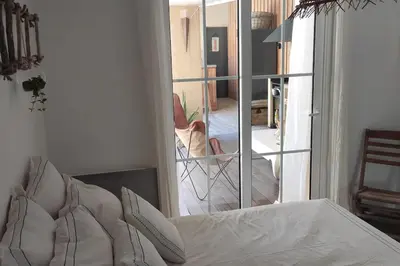 Un ou plusieurs lits dans un hébergement de l'établissement Cosy&Charme piscine chauffée Bassin d'Arcachon