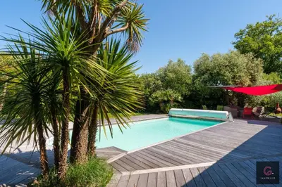 Piscine de l'établissement Villa avec piscine pour 8 personnes à Biscarrosse bourg ou située à proximité