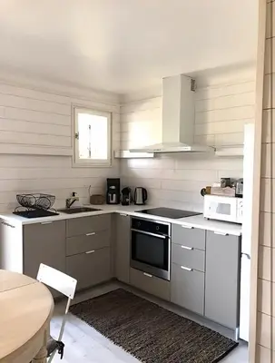 Cuisine ou kitchenette dans l'établissement Appartement en pleine nature