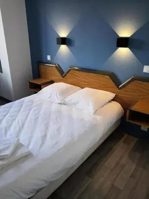 Un ou plusieurs lits dans un hébergement de l'établissement La Canotte