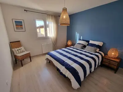 Un ou plusieurs lits dans un hébergement de l'établissement Belle Villa bassin d'Arcachon