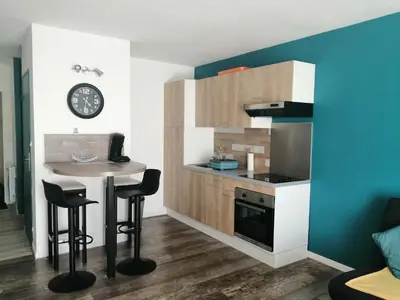 Cuisine ou kitchenette dans l'établissement Le DÉLICE DES DUNES