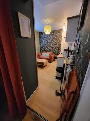 Coin salon dans l'établissement Appartement Domaine du Bost