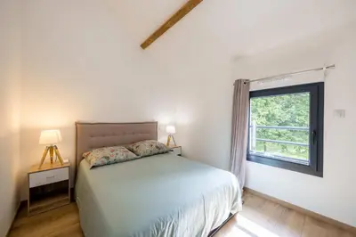 Un ou plusieurs lits dans un hébergement de l'établissement Gîte de Lamourelle