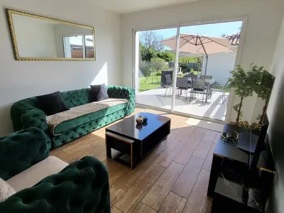 Coin salon dans l'établissement Maison au calme proche océan