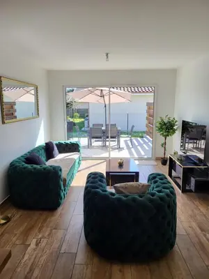 Coin salon dans l'établissement Maison au calme proche océan