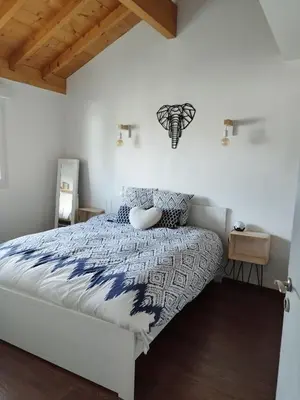 Un ou plusieurs lits dans un hébergement de l'établissement Maison au coeur de Capbreton