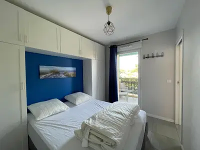 Un ou plusieurs lits dans un hébergement de l'établissement Charmant T2 proche plages et commerces avec terrasse à Vieux-Boucau - FR-1-239-1072
