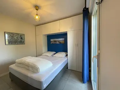 Un ou plusieurs lits dans un hébergement de l'établissement Charmant T2 proche plages et commerces avec terrasse à Vieux-Boucau - FR-1-239-1072