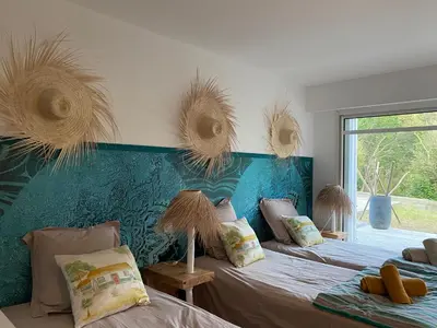 Un ou plusieurs lits dans un hébergement de l'établissement Villa Sand Golf by Carlon Luxury Rentals