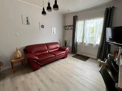 Coin salon dans l'établissement Cabane Meysouet-maison refaite à neuf vélo Bourg