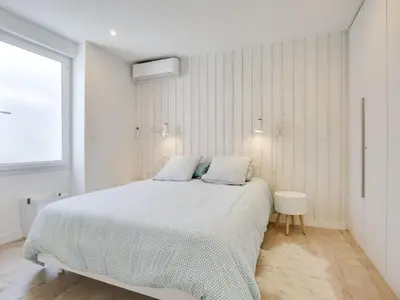 Un ou plusieurs lits dans un hébergement de l'établissement Holiday Home Le Chant Des 4 Sirènes by Interhome