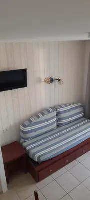 Coin salon dans l'établissement appartement dans résidence du golf proche du lac