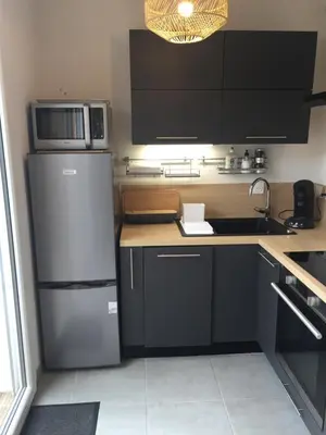 Cuisine ou kitchenette dans l'établissement LouEva