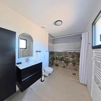 Salle de bains dans l'établissement Villa Chrisaline, Centre Moliets, 5 ch, 10 pers, clim, piscine chauffée, équipements premium