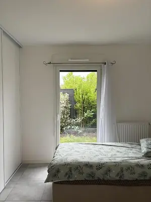 Un ou plusieurs lits dans un hébergement de l'établissement Appartement Biscarrosse