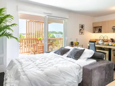 Un ou plusieurs lits dans un hébergement de l'établissement Apartment Jade et Elena-1 by Interhome