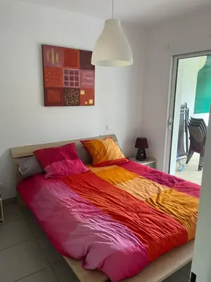 Un ou plusieurs lits dans un hébergement de l'établissement Appartement
