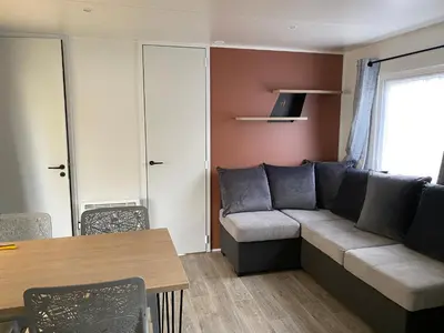 Coin salon dans l'établissement Mobil-home