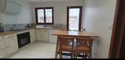 Cuisine ou kitchenette dans l'établissement Maison familiale Cazaux