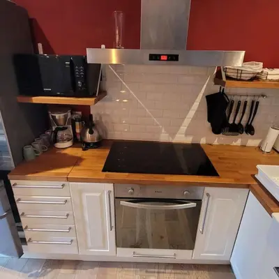 Cuisine ou kitchenette dans l'établissement le cocon discret
