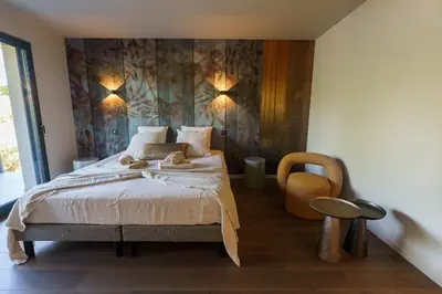 Un ou plusieurs lits dans un hébergement de l'établissement MAISON CHAPRON Villa de standing avec piscine, calme et golf à Biscarrosse