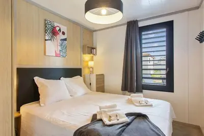 Un ou plusieurs lits dans un hébergement de l'établissement Chalet familial avec SPA
