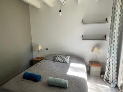 Un ou plusieurs lits dans un hébergement de l'établissement Maison 6 pers 3 Chb avec jardin, proche Golf Hossegor