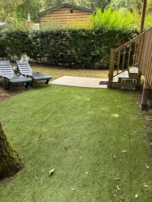 Jardin de l'établissement Mobil home 253 Camping La Réserve 4 étoiles à Gastes