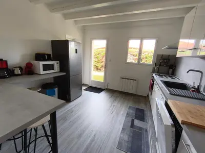 Cuisine ou kitchenette dans l'établissement Maison à 20 min des plages Landaises