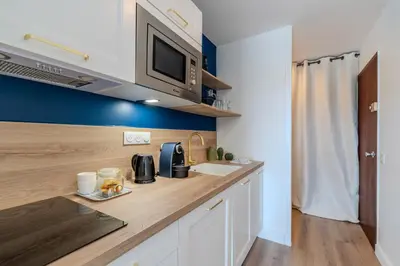 Cuisine ou kitchenette dans l'établissement Bulles de la Marina - Balnéo