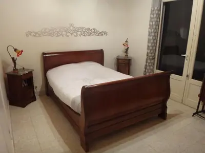 Un ou plusieurs lits dans un hébergement de l'établissement Villa landaise de charme avec piscine chauffée