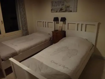 Un ou plusieurs lits dans un hébergement de l'établissement Villa landaise de charme avec piscine chauffée